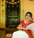 Jashiyaa Flosive Women's Present Banarasi Soft Lichi Silk Saree Beautiful Jacquard Rich Pallu Design Work Zari Woven Kanjivaram Silk Style Saree With Soft Lichi Silk Blouse Piece Ayn Royal White & Red