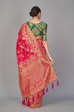 Jashiyaaa Monjolika Fashion Women's Banarasi Silk Blend Woven Zari With Tussles Saree and Jacquard Woven Blouse Piece Magenta